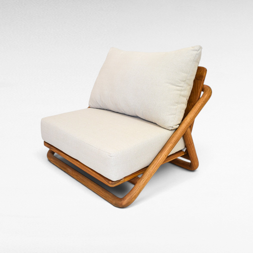 Chora Barefoot Luxury Living teak wood armchair with a beige fabric cushion and rounded solid wood frame