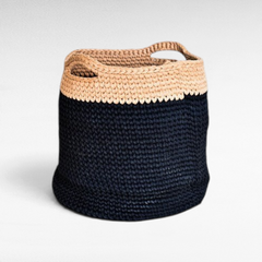 Chora Barefoot Luxury Living handmade cotton basket with a two-tone navy blue and beige woven design and side handles
