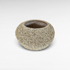 Chora Barefoot Luxury Living handcrafted rattan basket featuring an intricate, textured beaded exterior finish.