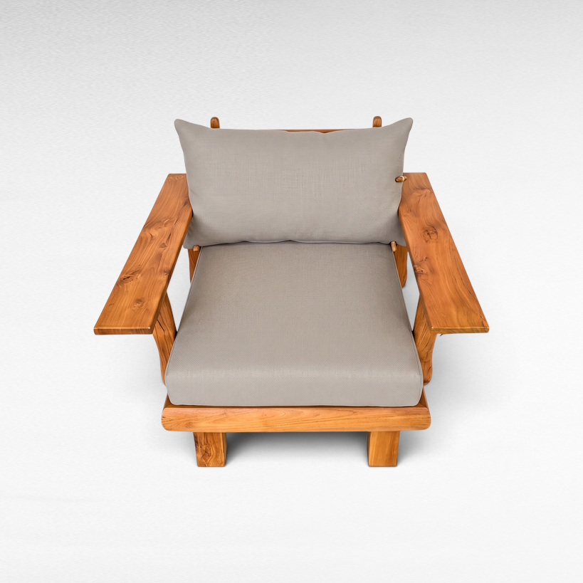 Chora Barefoot Luxury Living teak wood armchair with grey cushions and wide armrests on a white background