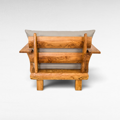 Chora Barefoot Luxury Living teak wood armchair back view with cream cushions and natural wood grain finish