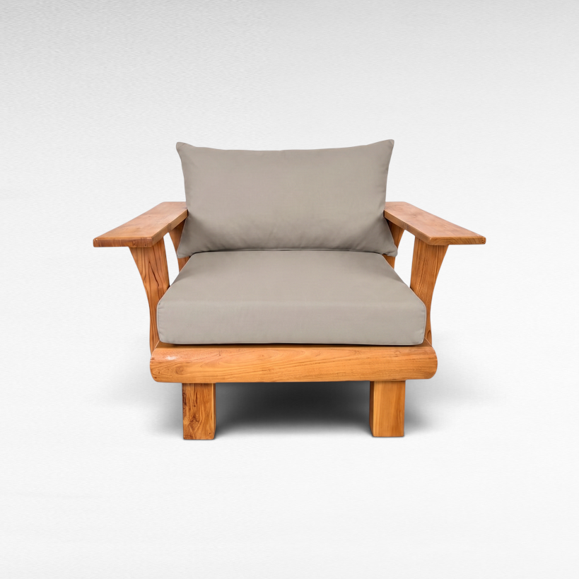 Chora Barefoot Luxury Living teak wood armchair with grey cushions and wide armrests on a white background