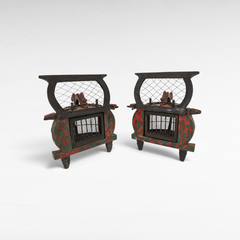 Pair of antique Chora Barefoot Luxury Living bird cages with distressed red and green painted wood and wire mesh.