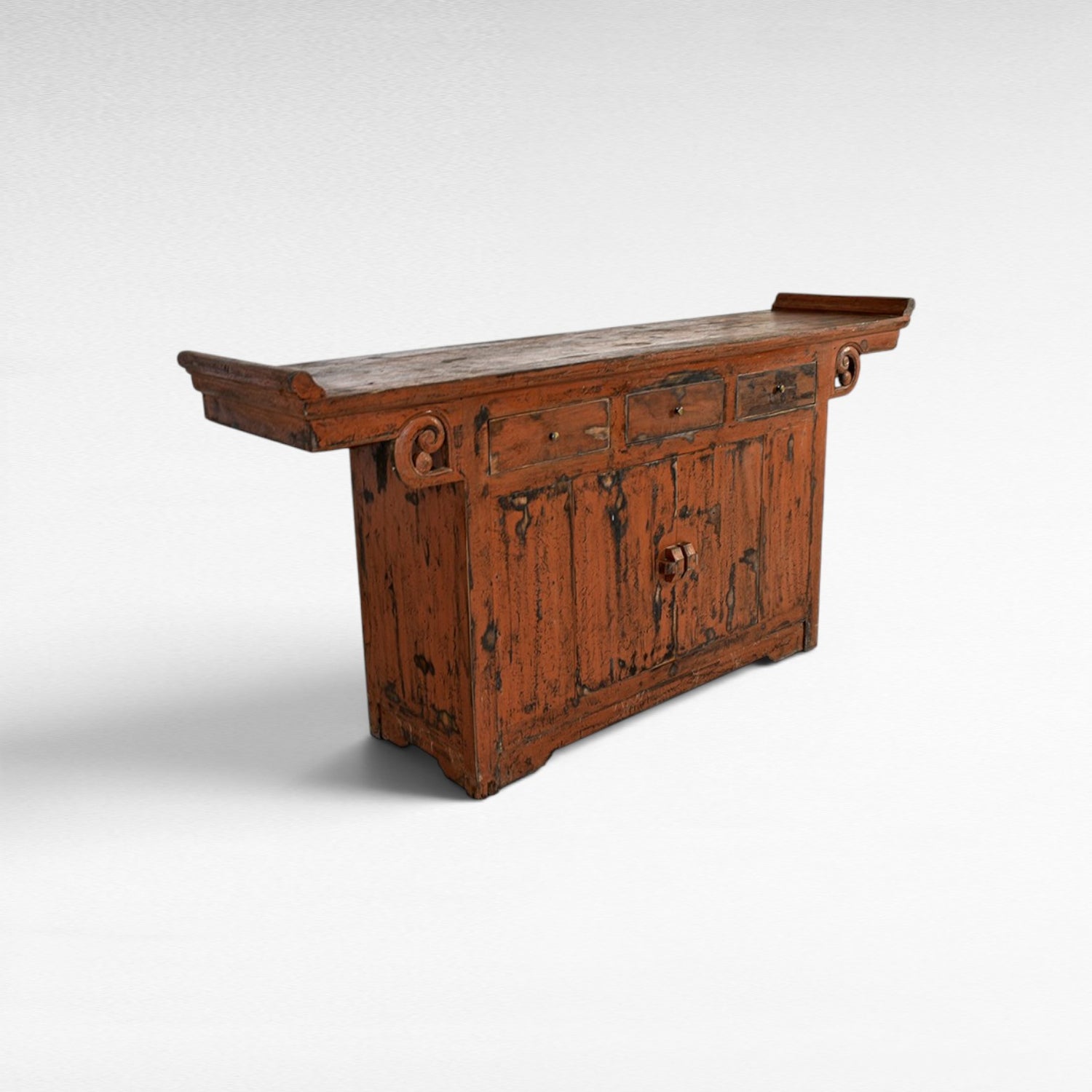 Chora Barefoot Luxury Living antique distressed orange wooden buffet with carved details and three drawers