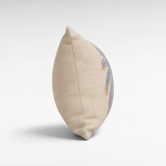 Chora Barefoot Luxury Living beige linen throw pillow with blue palm tree embroidery, side profile view