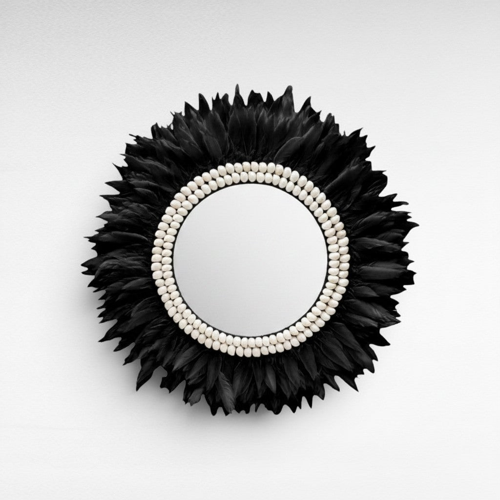 Chora Barefoot Luxury Living black feather mirror with white bead accent, 60 cm diameter.