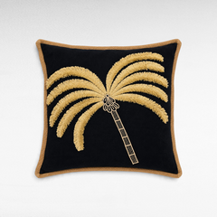Chora Barefoot Luxury Living square black decorative pillow with a gold embroidered palm tree and jute trim