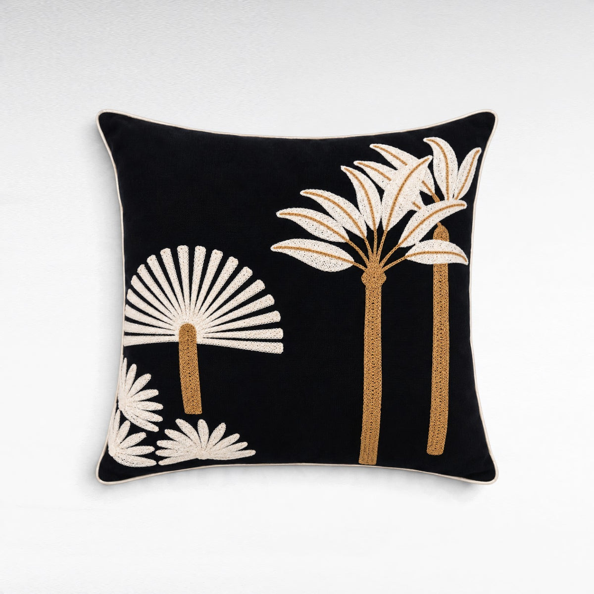 Chora Barefoot Luxury Living square black throw pillow with embroidered cream and gold palm tree tropical motifs