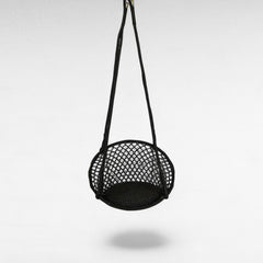 Chora Barefoot Luxury Living black macrame rope hammock swing with padded seat, perfect for serene relaxation.