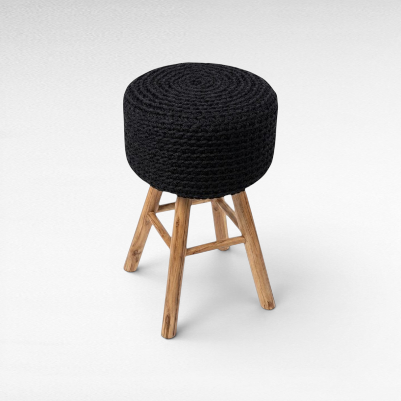 Chora Barefoot Luxury Living round stool with a black woven rope seat and natural oak wood legs.