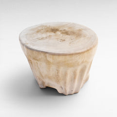 Chora Barefoot Luxury Living bleached suar wood stool with a natural live edge round top and organic textured base.