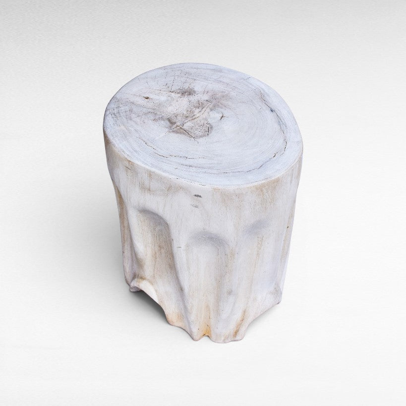 Chora Barefoot Luxury Living bleached suar wood stool with a natural organic tree trunk design