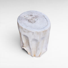 Chora Barefoot Luxury Living bleached suar wood stool with a natural organic tree trunk design
