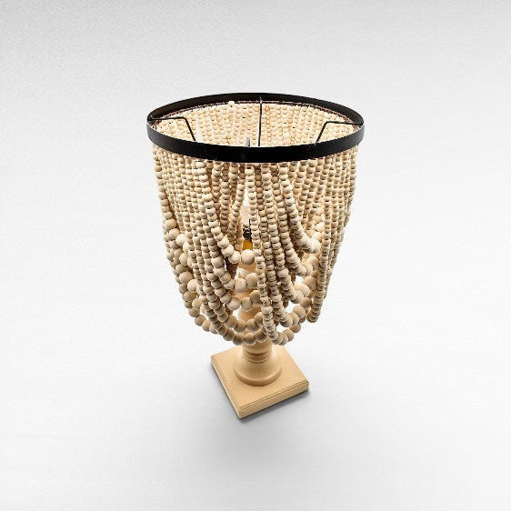 Chora Barefoot Luxury Living bleached wood table lamp with beaded shade and square base.