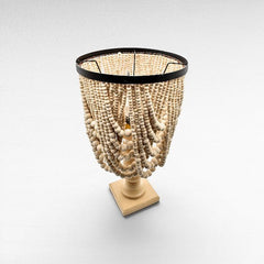 Chora Barefoot Luxury Living bleached wood table lamp with beaded shade and square base.