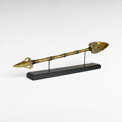 Chora Barefoot Luxury Living brass golden sword with ornate detailing and a black display stand.