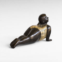 Chora Barefoot Luxury Living bronze and gold yoga figurine in cobra pose, detailed floral pattern on swimsuit.