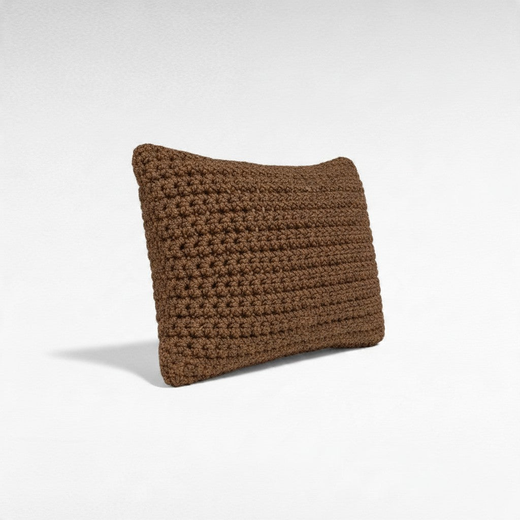 Chora Barefoot Luxury Living brown cotton rope decorative pillow with a textured crochet knit design