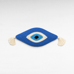 Chora Barefoot Luxury Living cotton eye pillow in blue, white, and black with decorative side tassels