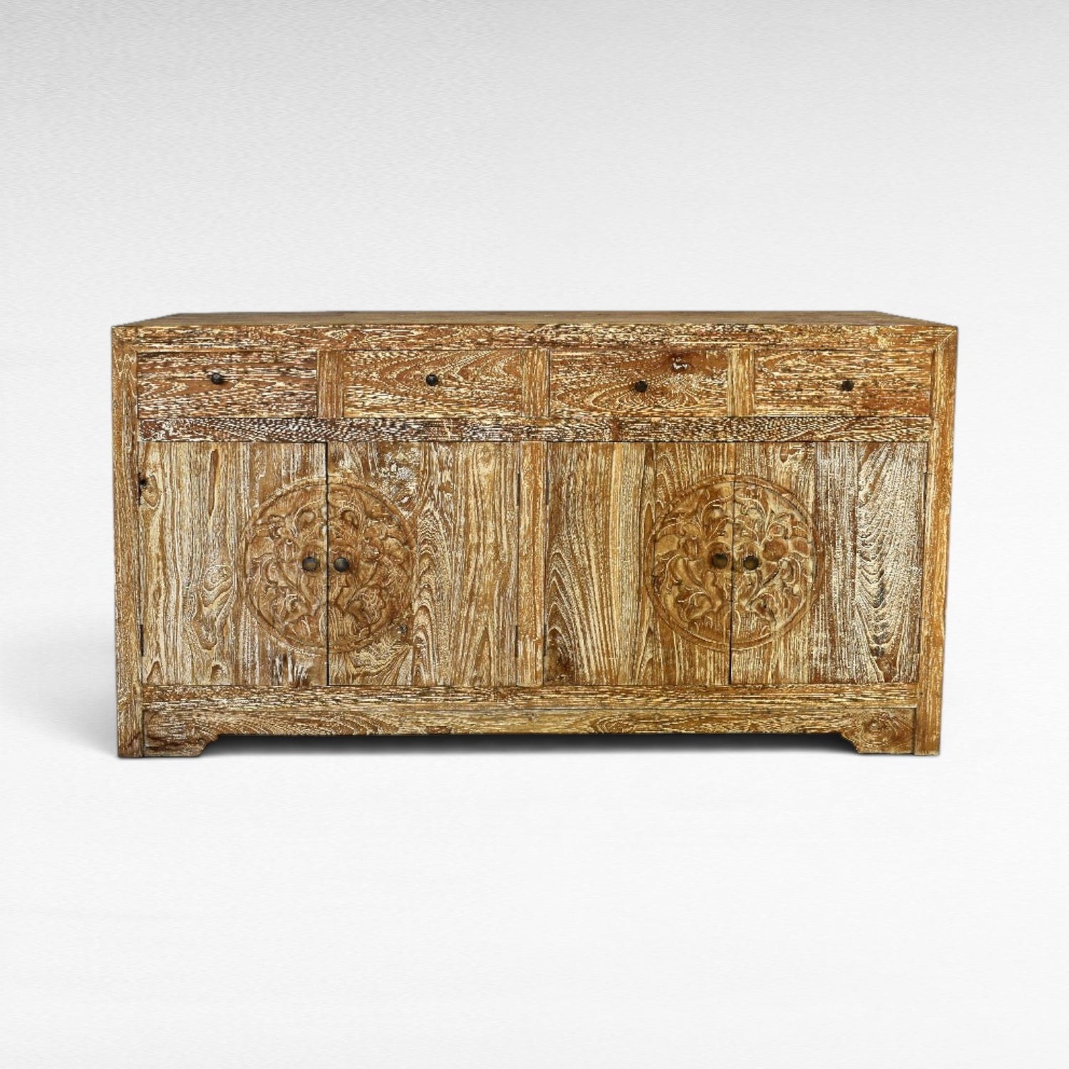Chora Barefoot Luxury Living distressed wood buffet with carved circular motifs on doors and five drawers.