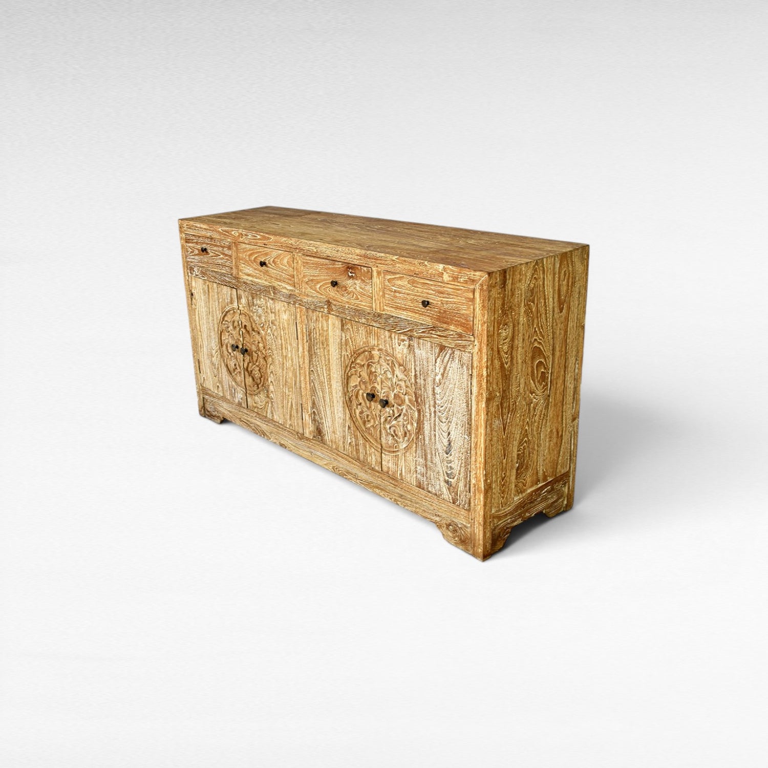 Chora Barefoot Luxury Living distressed wood sideboard with carved circular motifs on doors and 4 drawers.