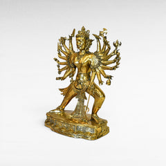 Chora Barefoot Luxury Living golden brass multi-armed deity figurine, ornate details, W95 H120 cm.