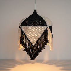 Chora Barefoot Luxury Living handmade black and white macrame pendant light with geometric patterns and fringe detail