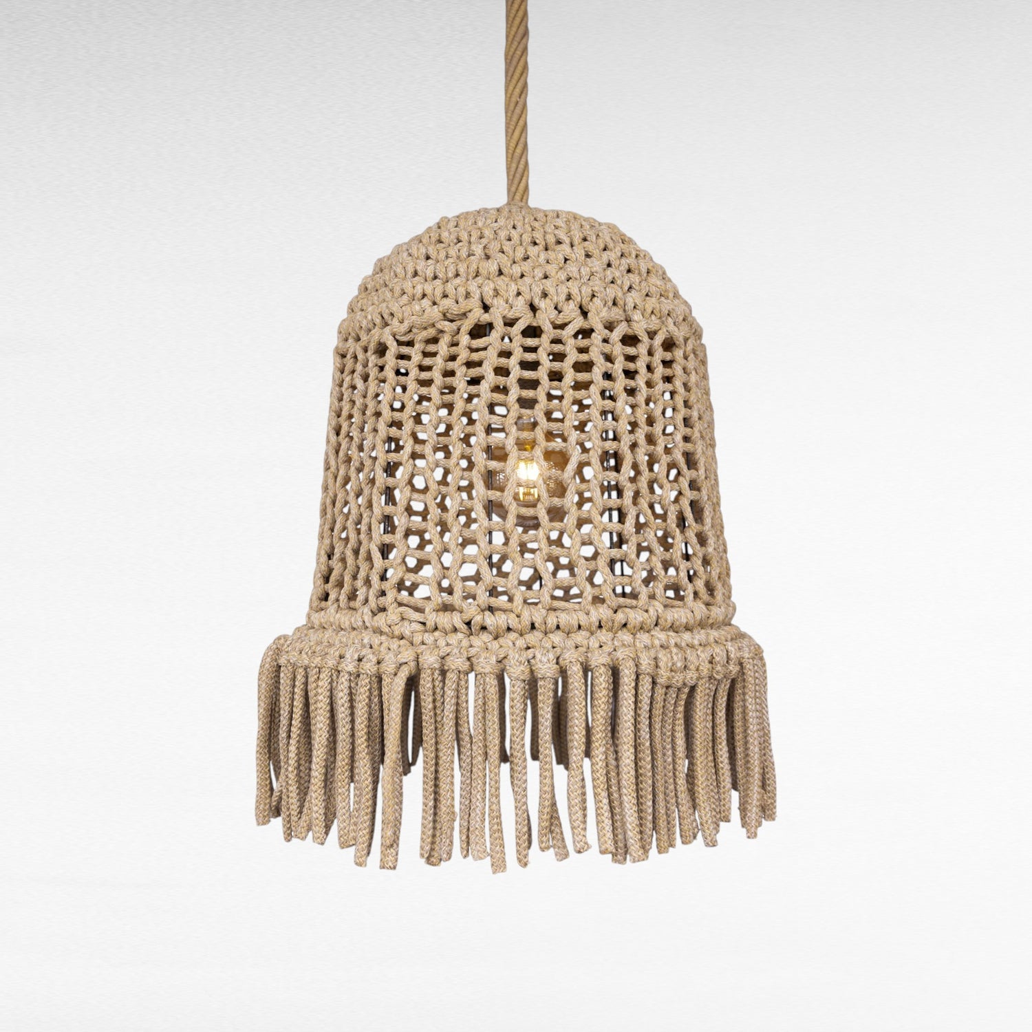 Chora Barefoot Luxury Living natural rope pendant light with fringe detail, bell shape, macrame style