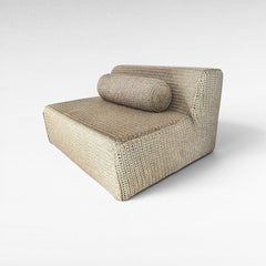 Chora Barefoot Luxury Living natural rope sofa with a cylindrical bolster cushion in a textured woven design