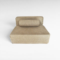 Chora Barefoot Luxury Living natural rope sofa with a cylindrical back cushion in a minimalist woven design.