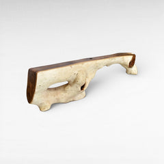 Chora Barefoot Luxury Living natural wood console table with organic shape and carved-out openings.