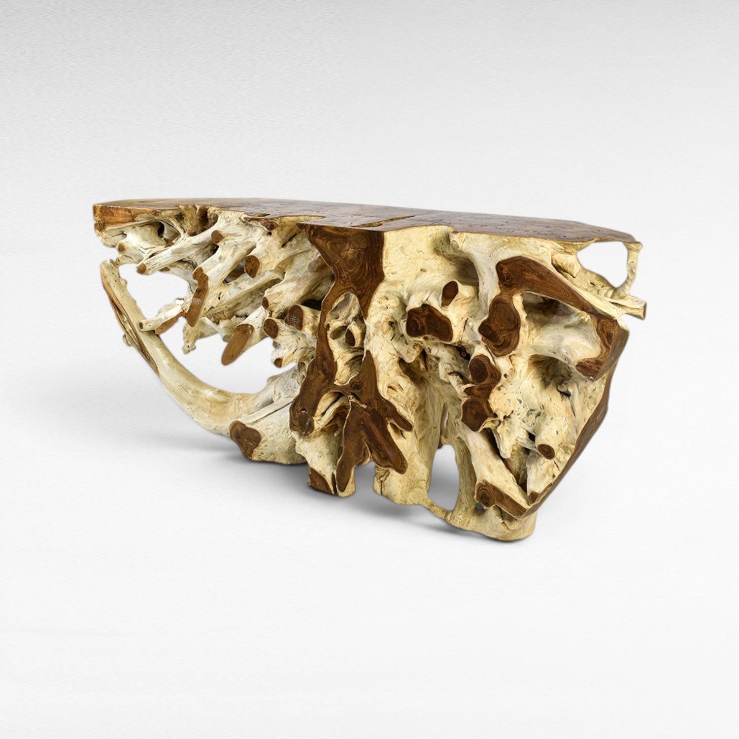 Chora Barefoot Luxury Living natural wood console table with organic, sculptural base and smooth top.