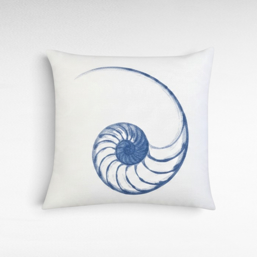 Chora Barefoot Luxury Living square white throw pillow featuring a blue hand-drawn nautilus shell design