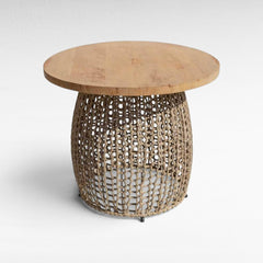 Chora Barefoot Luxury Living round dining table with a natural oak wood top and a hand-woven cotton rope base.