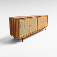 Chora Barefoot Luxury Living Viennesse rattan buffet cabinet with four doors and natural wood frame.