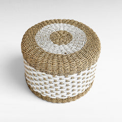 Chora Barefoot Luxury Living round synthetic rattan stool in natural and white woven pattern