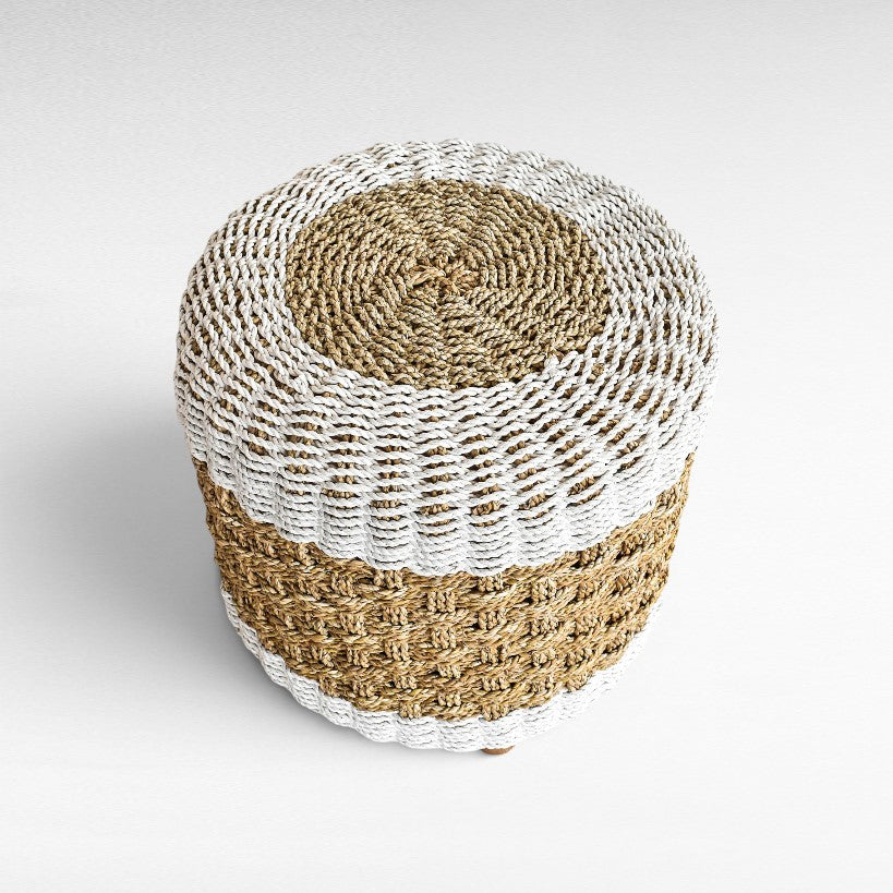 Chora Barefoot Luxury Living round synthetic rattan stool in natural and white woven pattern