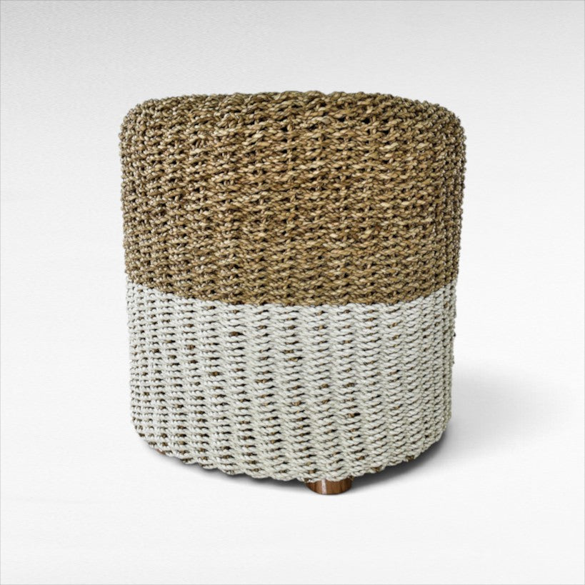 Chora Barefoot Luxury Living round stool made of natural and white synthetic rattan with a woven textured finish