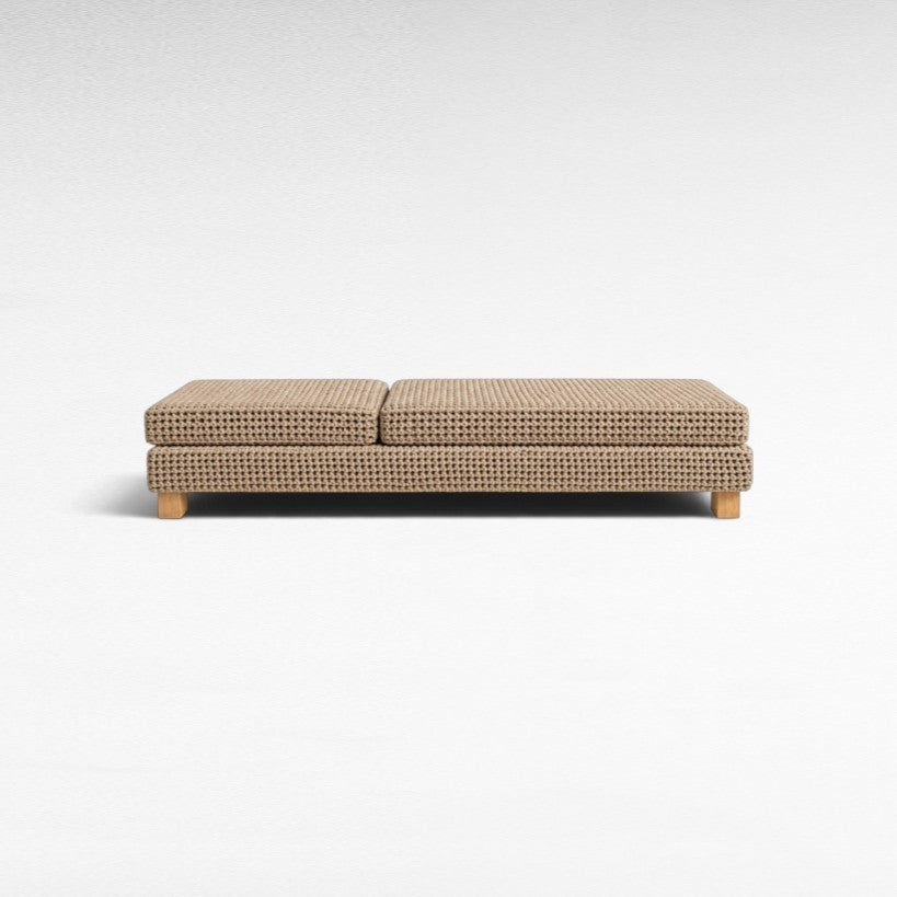 Chora Barefoot Luxury Living rope daybed with a textured beige woven finish and low wooden base
