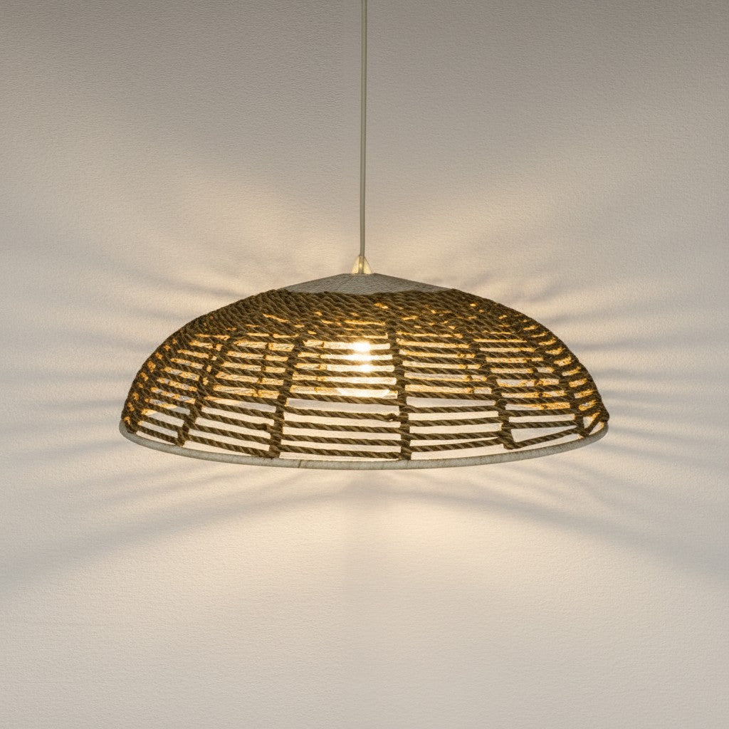 Chora Barefoot Luxury Living handmade natural rope pendant light with a wide dome shape casting soft shadows