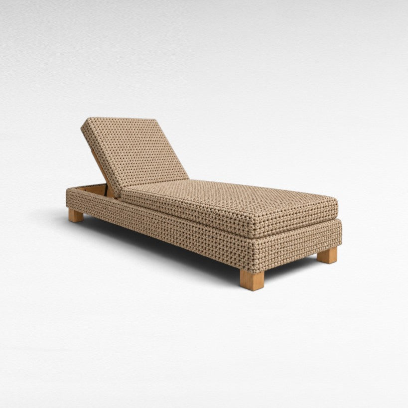 Chora Barefoot Luxury Living rope sun lounger with a beige woven texture and wooden base on a white background