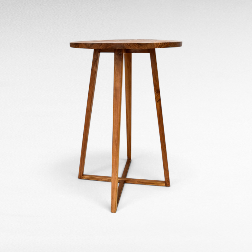 Chora Barefoot Luxury Living round wooden bar table with a minimalist design and sturdy cross-base legs.