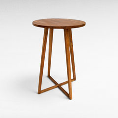 Chora Barefoot Luxury Living round wooden bar table with a minimalist design and cross-base legs for modern interiors.