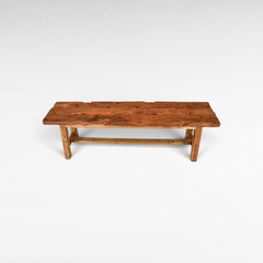 Chora Barefoot Luxury Living rustic solid teak wood bench with a distressed finish and natural organic grain patterns.