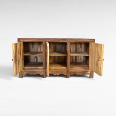 Chora Barefoot Luxury Living rustic wood buffet with 3 doors and 3 shelves, natural wood finish, ornate carved base.