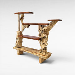 Chora Barefoot Luxury Living rustic wood tiered shelf unit with natural wood grain and varying textures.