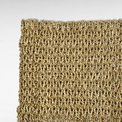 Chora Barefoot Luxury Living woven natural seagrass mat, 40 cm diameter, with a textured open-weave pattern.