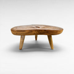 Chora Barefoot Luxury Living natural suar wood coffee table with organic grain and honey tones. Unique, solid wood construction.