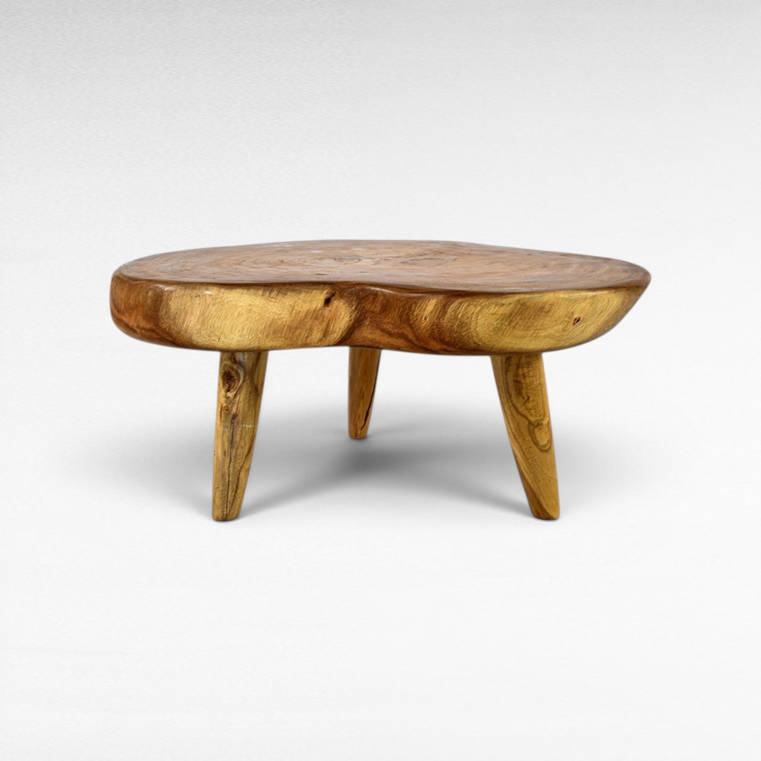 Chora Barefoot Luxury Living natural suar wood coffee table with organic grain and honey tones. Unique, solid wood construction.