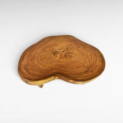 Chora Barefoot Luxury Living natural suar wood coffee table with organic grain patterns and honey tones. Unique, solid wood construction.